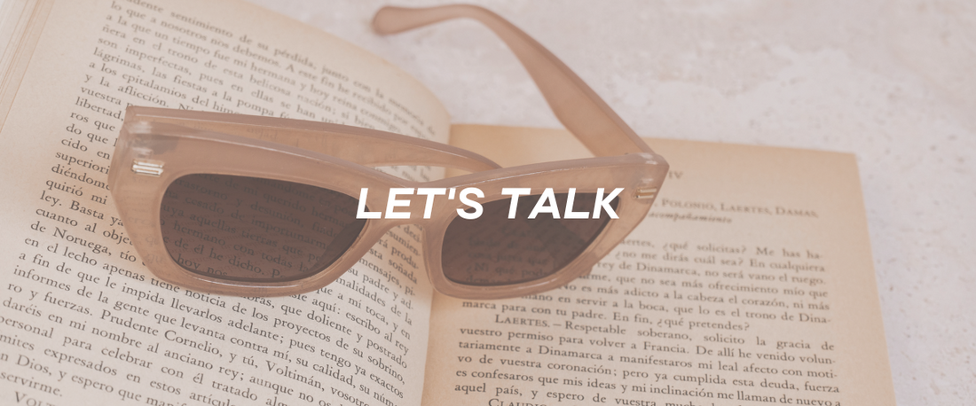 let's talk with a book and sunglasses background