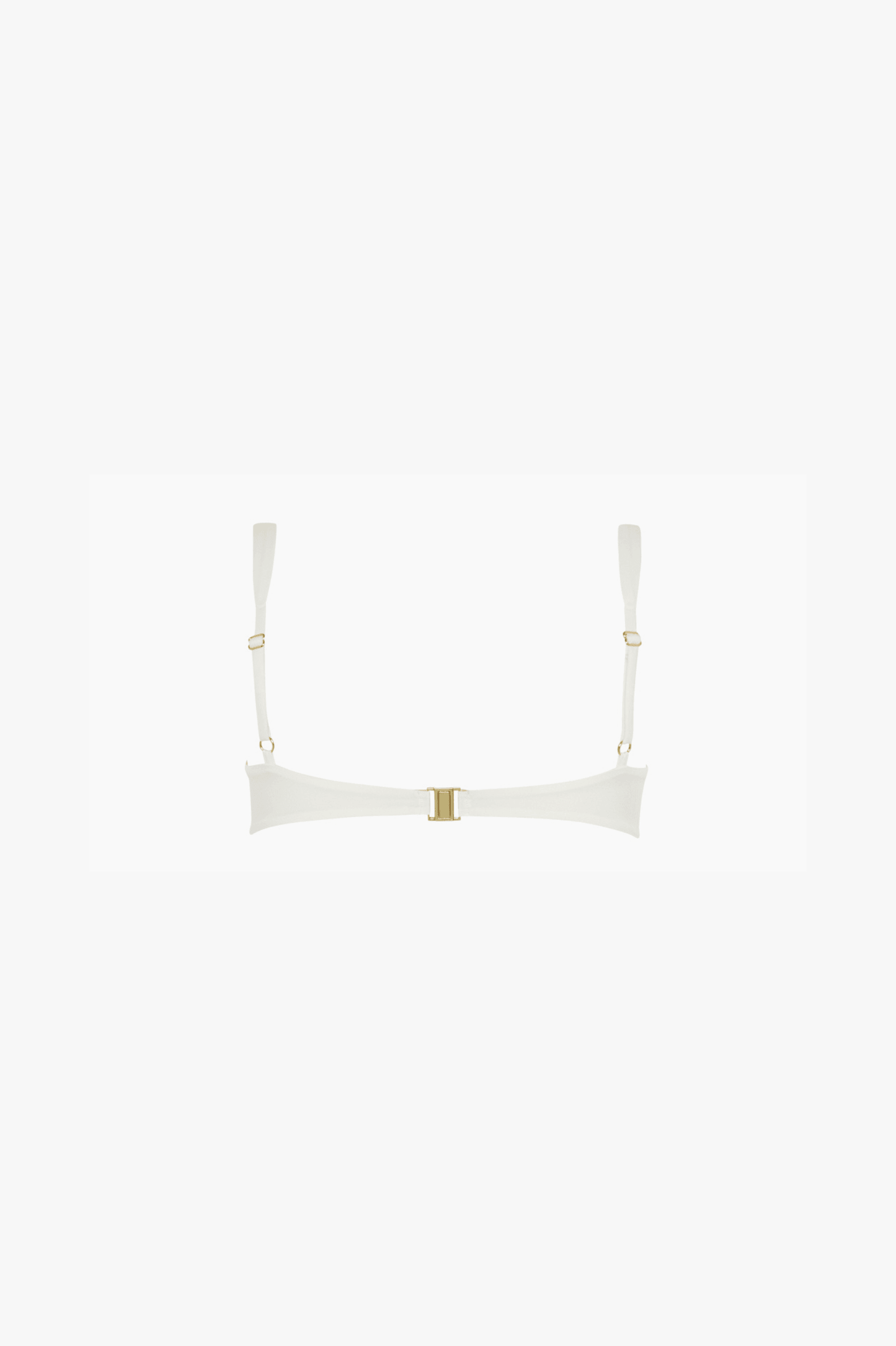 An off-white bikini top with a wide, curved band and thin shoulder straps, featuring a small gold metal closure at the center and gold rings at the strap attachments, set against a solid white background.