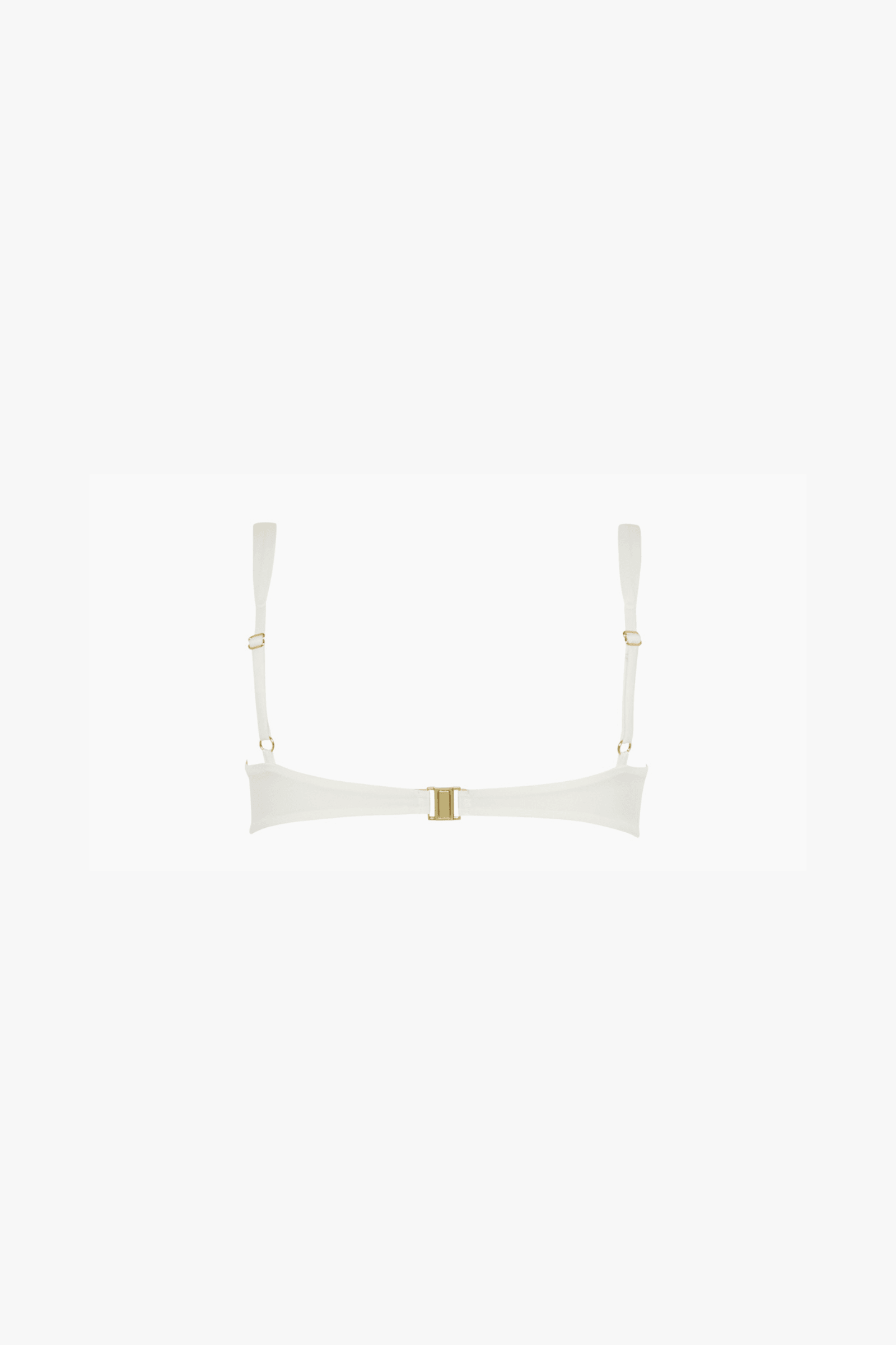 An off-white bikini top with a wide, curved band and thin shoulder straps, featuring a small gold metal closure at the center and gold rings at the strap attachments, set against a solid white background.